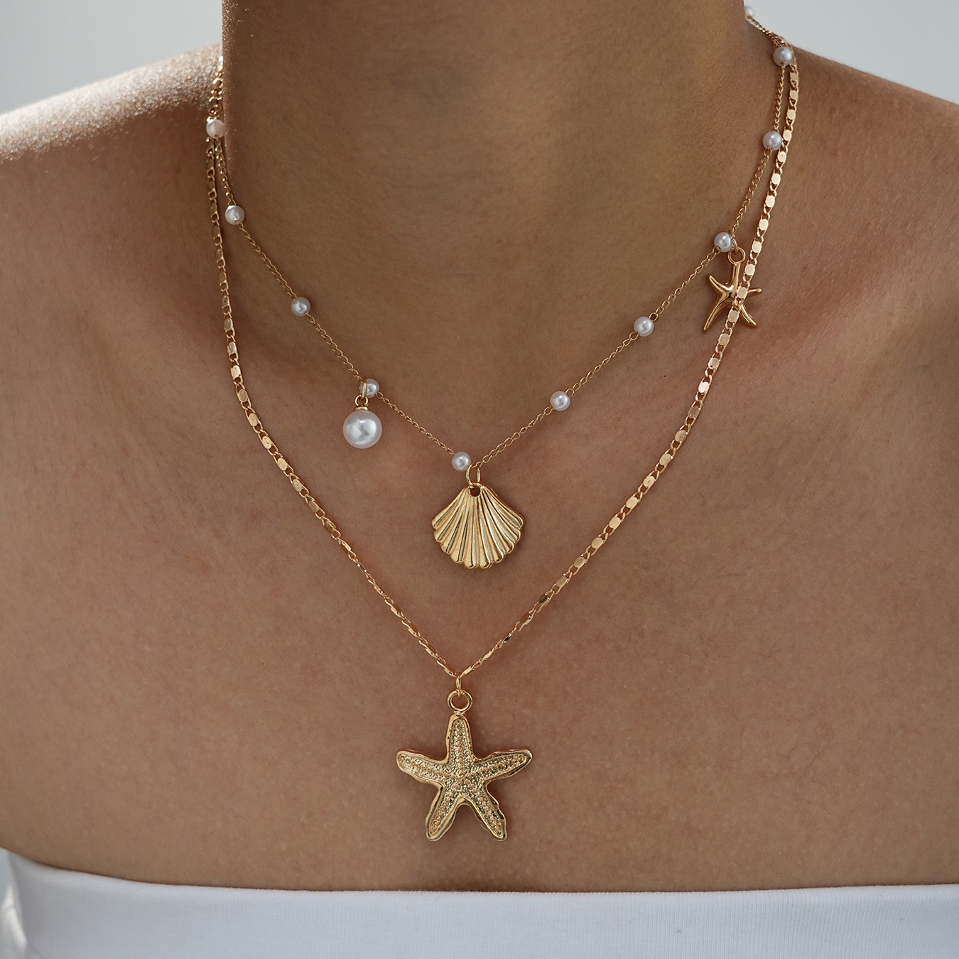 Golden Sun Pearl Necklace | สร้อยคอจี้พระอาทิตย์มุกสีทอง